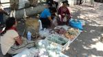 street vendors across the Chiang Mai market, near the Narawat bridge